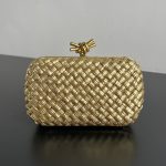 Bottega Veneta Knot Intrecciato clutch bag with a metallic knot clasp