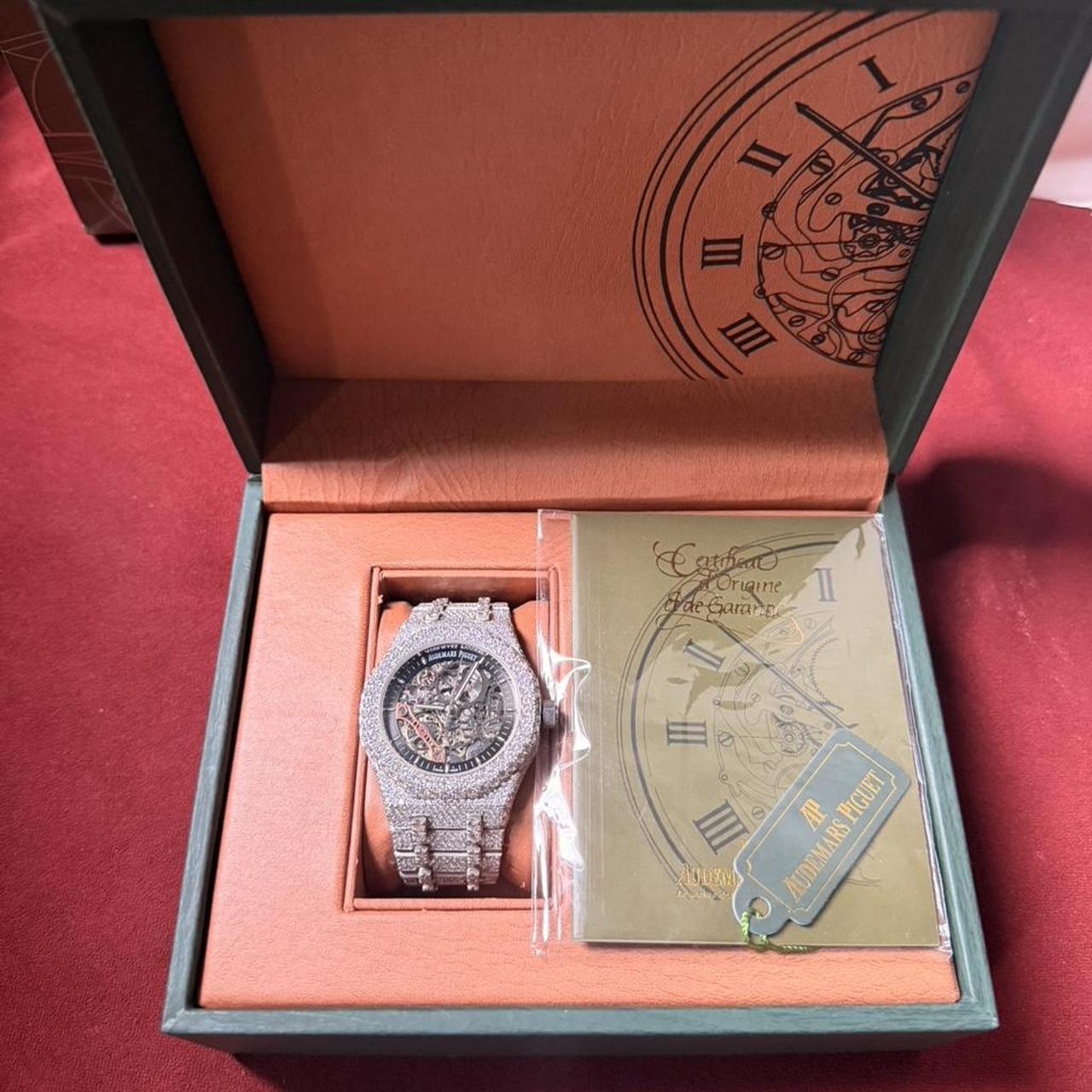 P0 (1) Audemars Piguet Men's Silver and Orange Watch - Image 1