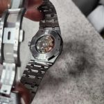 Audemars Piguet Men's Silver and White Watch - Image 4