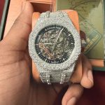 Audemars Piguet Men's Silver and Orange Watch - Image 2