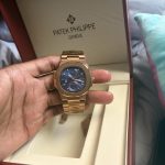 Patek Philippe Men's Gold and Brown Watch