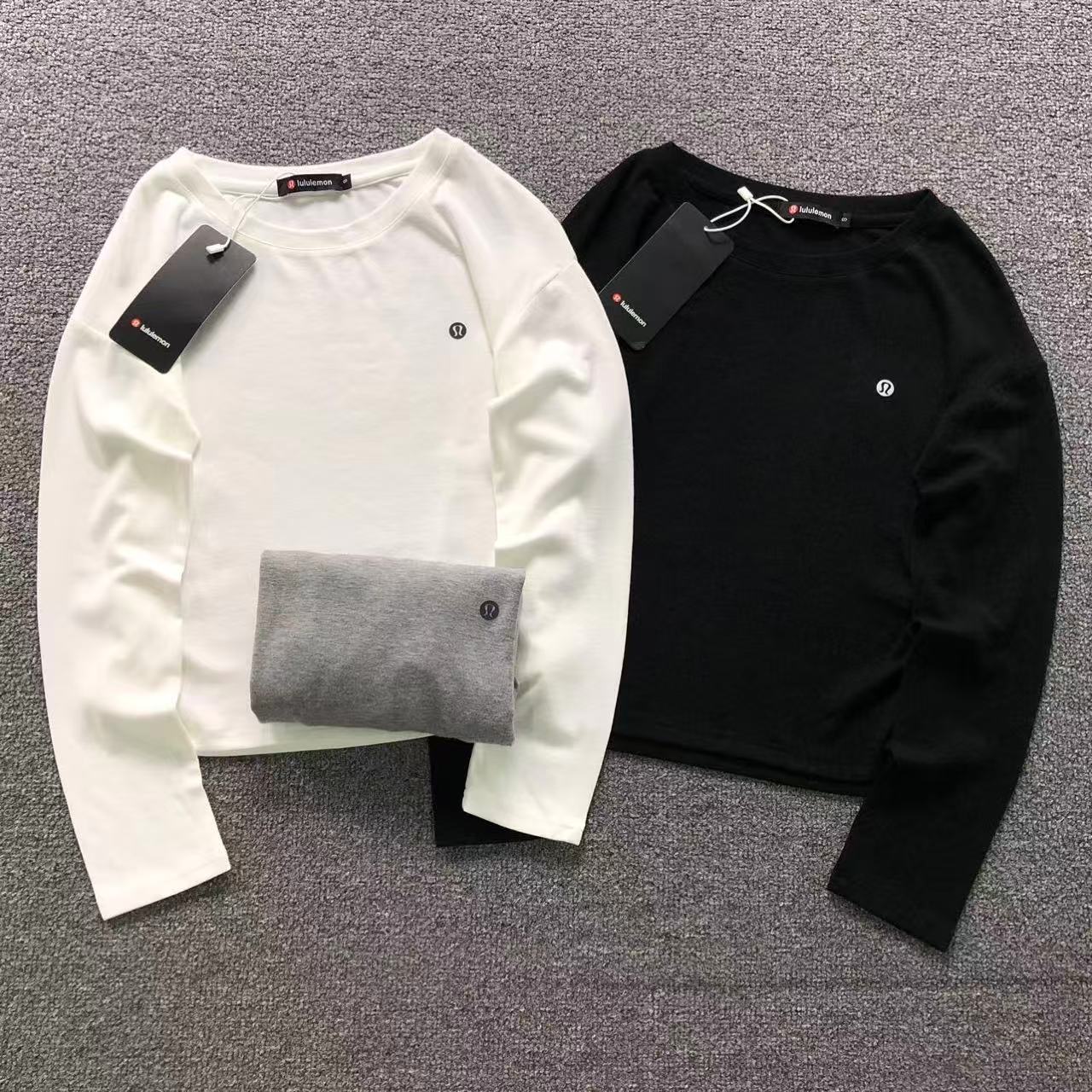 275f8394 LULULEMON LONG SLEEVED FEMAIE - Image 1